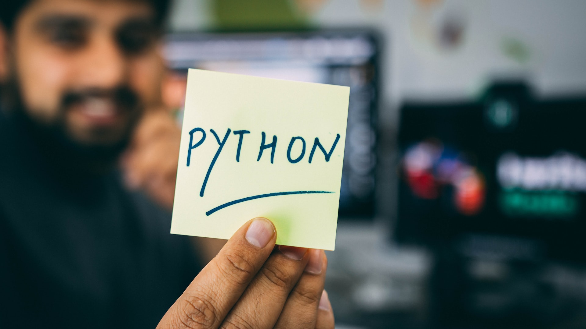 %UPDATE% Picture of the word python written on a stick note.